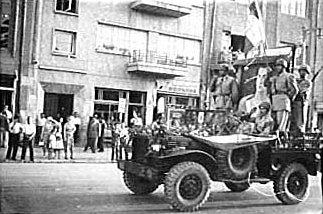  The coup d'�tat makers (the Shah's troops) carrying the portrait of the Shah, August 19, 1953